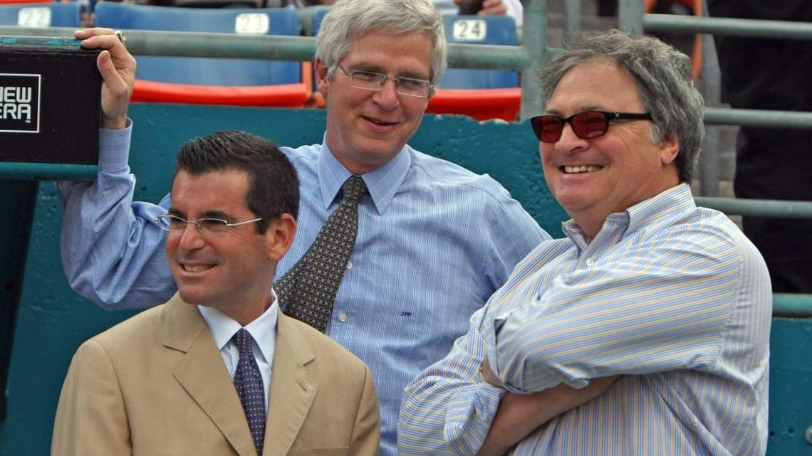 How much did Jeffrey Loria make from the $1.2 billion sale of the Miami Marlins in 2017? This file photo from 2008 shows his two top deputies, president David Samson, left, and vice chairman Joel Mael, center, and Loria.