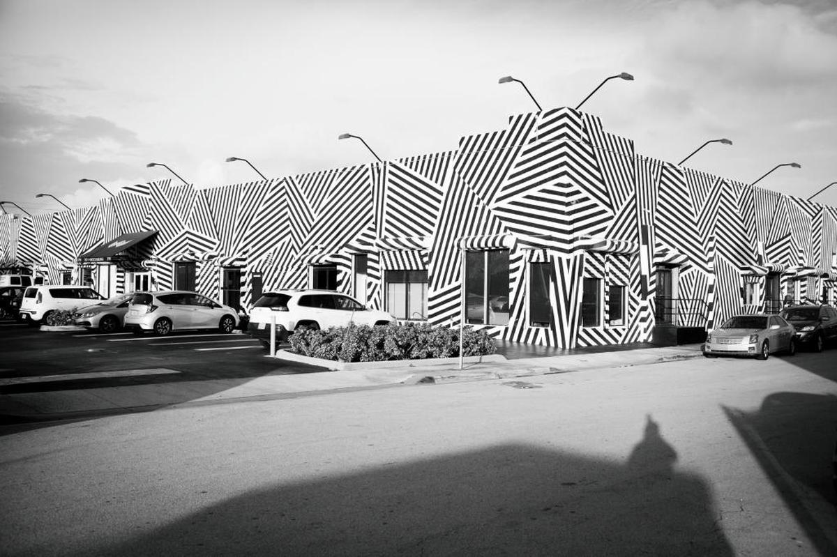 The zebra-striped Wynwood Building sits on Northwest Third Avenue, which will be transformed into a “woonerf,” a street in which cars, bikes and pedestrians share the pavement on an equal footing.