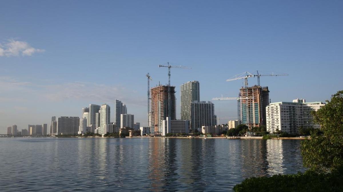 Cranes help create high-rises in Miami’s Edgewater neighborhood, looking southwest from the Julia Tuttle Causeway.