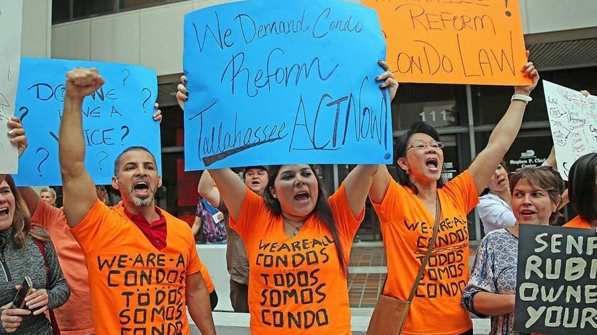 Condo owners protest outside the government center in downtown Miami in support of Condo Law Reform on Wednesday, February 22, 2017.