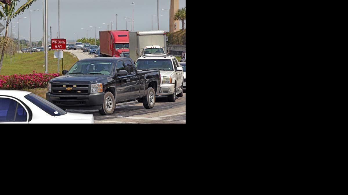 
Commuters exit on Northwest 107th Avenue northbound on the first day of the new traffic shift on SR-836 Monday, March 23, 2015.
