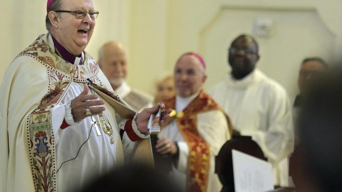 The Right Rev. Bishop Leo Frade, left, addresses hundreds at Trinity Cathedral in downtown Miami during his Farewell Mass on Saturday, Jan. 9, 2016. Frade was head of the Episcopal Diocese of Southeast Florida. In October, he turned 72 — the mandatory retirement age in the Episcopal Church. Long esteemed for his social activism, Frade has endeared himself to many, including those in the Hispanic, Haitian and LGBT communities, for his vocal support. The Right Rev. Peter Eaton, center, who was Bishop Coadjutor of Southeast Florida, is Frade's successor.