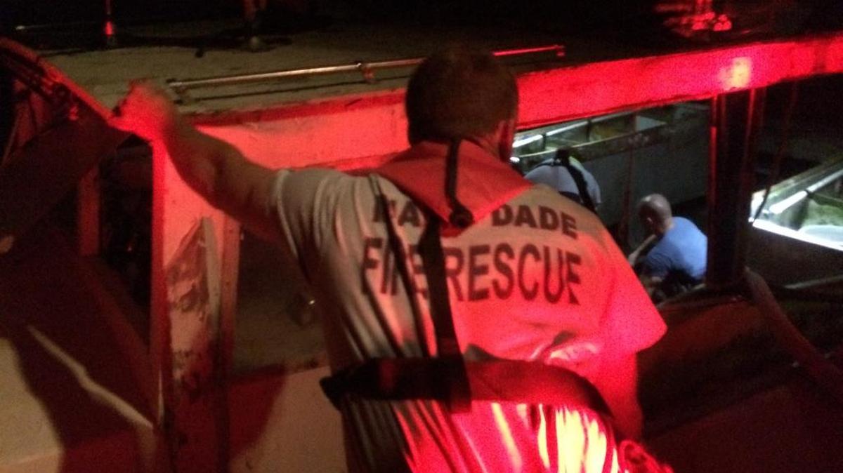 Miami-Dade Fire Rescue bail out a sinking shrimp boat near Chicken Key just before midnight Saturday.