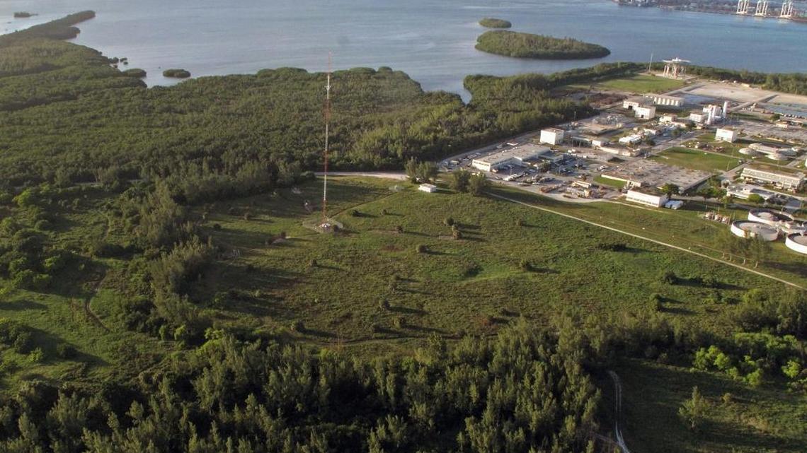 The site of a closed landfill on Virginia Key is at the center of this aerial view taken in 2011. The Miami-Dade sewage-treatment plant is at upper right. The green section at the upper left is a state nature preserve.