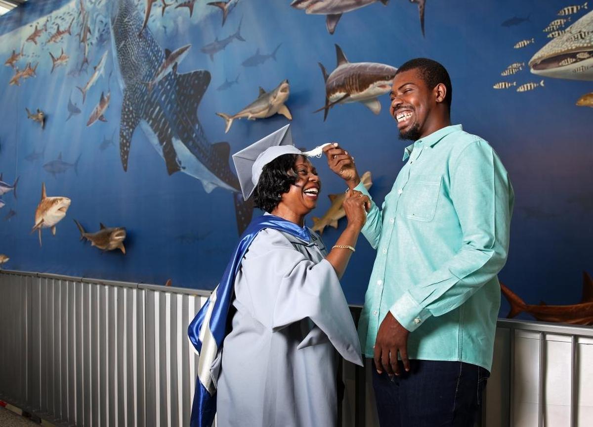 Damaris Hall, 58 who is graduating with her master’s degree in national security affairs at Nova Southeastern University’s department of history and political science, is pictured with her son, James Hall, 23, who is also a student at NSU working on his master’s in international business. Damaris has completed six tours of duty in the U.S. Air Force in Afghanistan, Pakistan, Emirates and Kyrgyzstan and will be graduating in June.