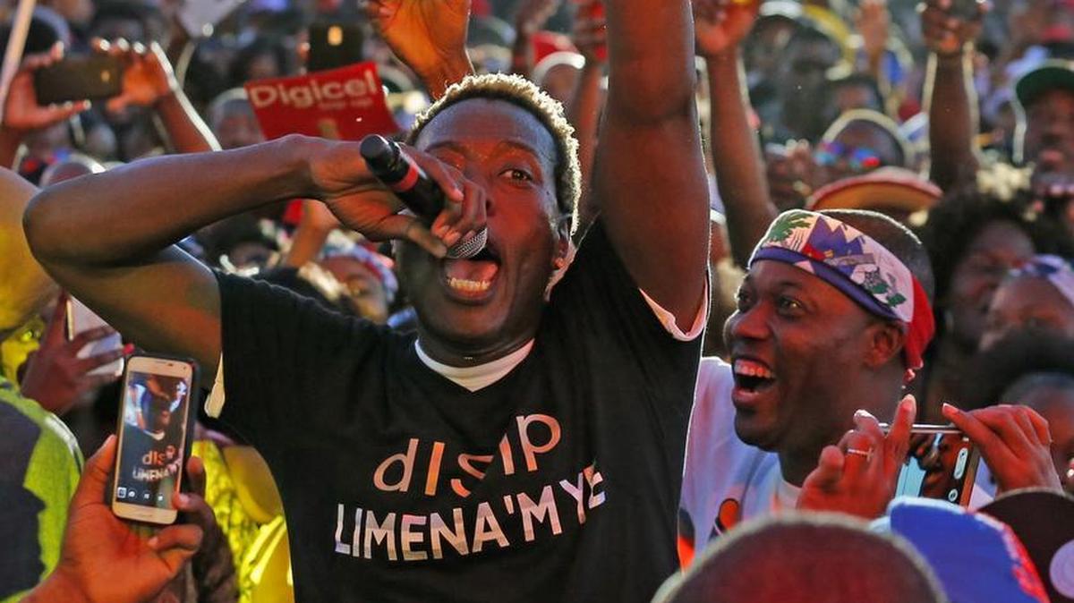 Haitian artist Gazzman Couleur sings in the crowd during the Haitian Compas Festival at Sun Life Stadium on Saturday, May 16, 2015