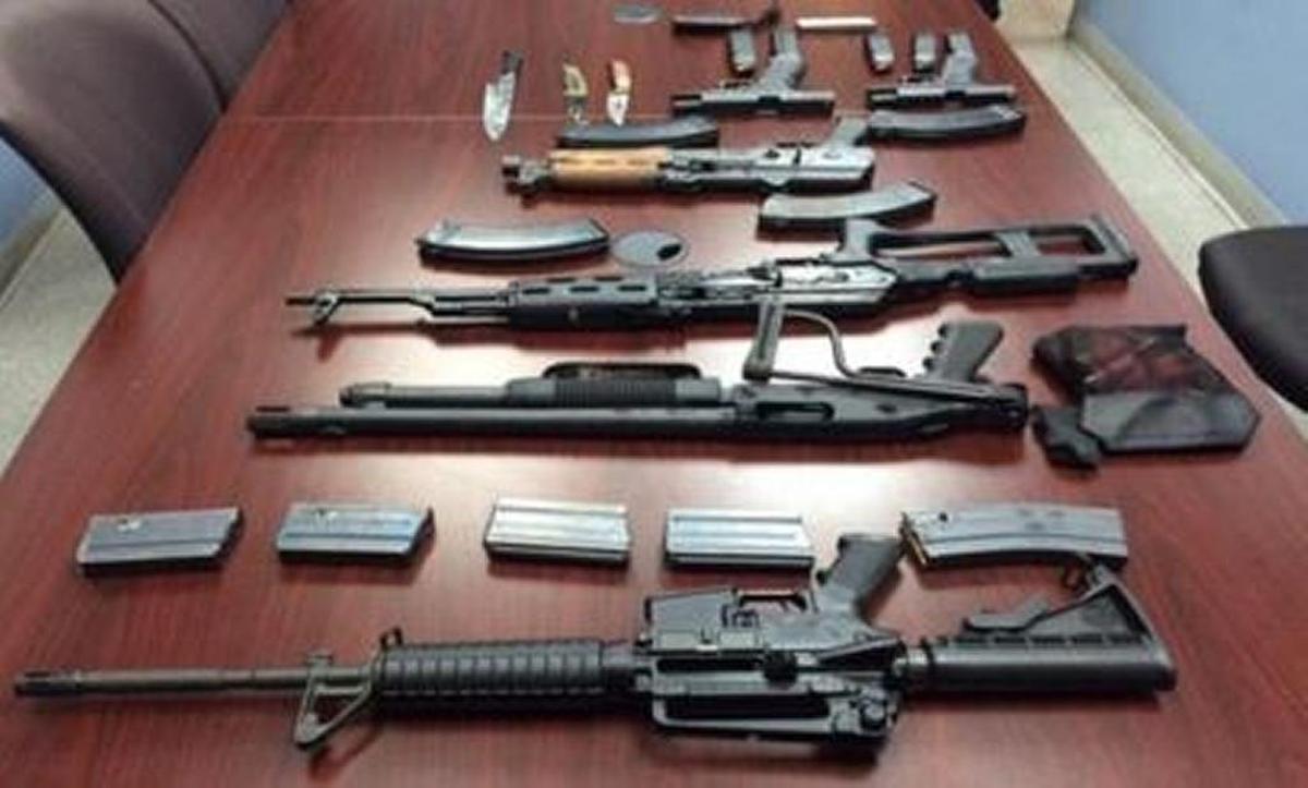 The firearms taken from Victor Hall after his arrest by South Miami police.