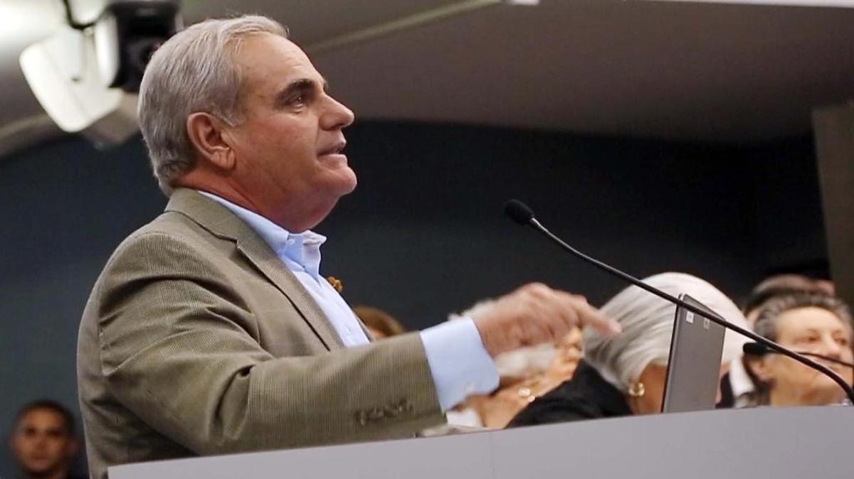 Former Miami City Manager Joe Arriola speaks to the Mayor and Commissioners of Miami Beach during a meeting on April 13, 2016.
