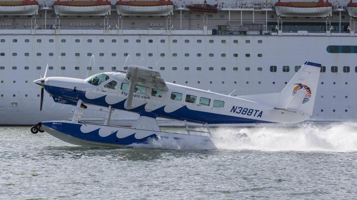 A seaplane takes off near Watson Island as it heads toward Bimini, Bahamas.