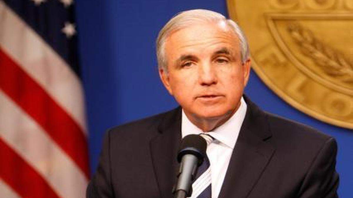 
Mayor Carlos Gimenez unveils his proposed at County Hall on July 8, 2014. A year later, his administration still has to negotiate labor contracts for nearly half of the county’s unionized workers. 
