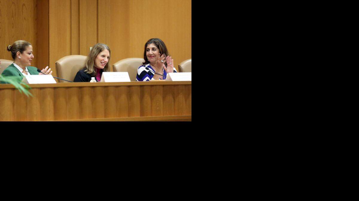 
(L) Marisel Losa, CEO of Health Council of South Florida welcomes Health and Human Services Secretary Sylvia Burwell (C) along with Karen Egozi, CEO of the Epilepsy Foundation of Florida (R) during a visit to FIU for a panel discussion on the rollout of the 2015 enrollment period for health insurance under Obamacare on Monday, Nov. 17, 2014.
