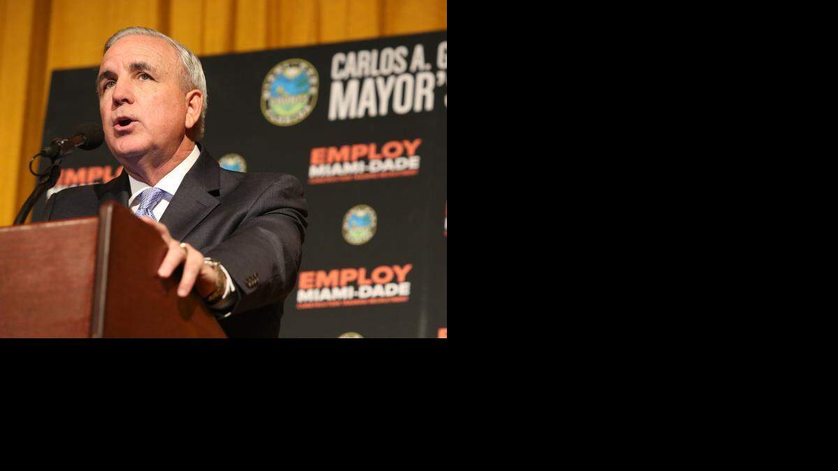 
Miami-Dade Carlos Gimenez at a Dec. 15 announcement of a hiring initiative in Liberty City. 
