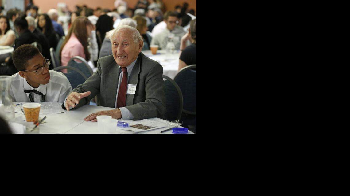 
Holocaust survivor Julius Eisenstein talks to Casen Matthews and other students about his time spent imprisoned in Dachau Concentration Camp during WWII. During Miami-Dade County Student Awareness Day, a prejudice reduction and anti-bullying program, students discuss with Holocaust survivors the effects of modern-day racism and hatred.
