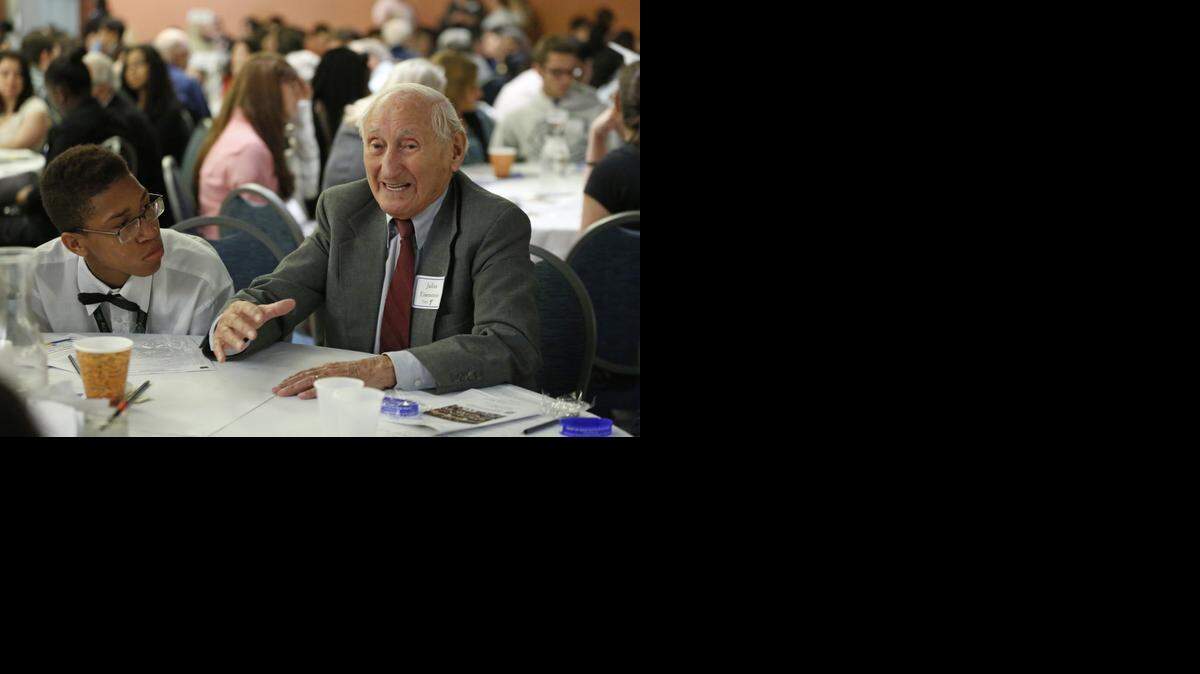 
Holocaust survivor Julius Eisenstein talks to Casen Matthews and other students about his time spent imprisoned in Dachau Concentration Camp during WWII. During Miami-Dade County Student Awareness Day, a prejudice reduction and anti-bullying program, students discuss with Holocaust survivors the effects of modern-day racism and hatred.
