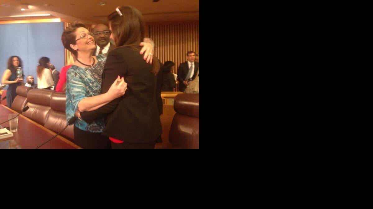
Chairwoman Rebeca Sosa hugs Budget Director Jennifer Moon after Thursday’s short budget hearing.
