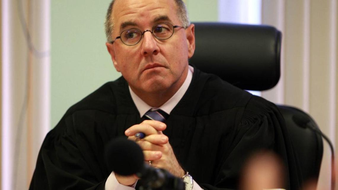 Judge Michael A. Hanzman has called a hearing on a group home where two foster children were encouraged to fight.