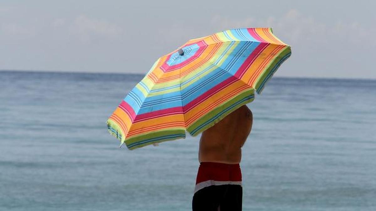 An early morning beachgoer on Hollywood Beach. Miami Herald file.