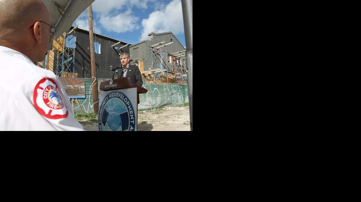 HOT PROPERTY?  City Commissioner Marc Sarnoff stands near the historic firehouse as it was being renovated.