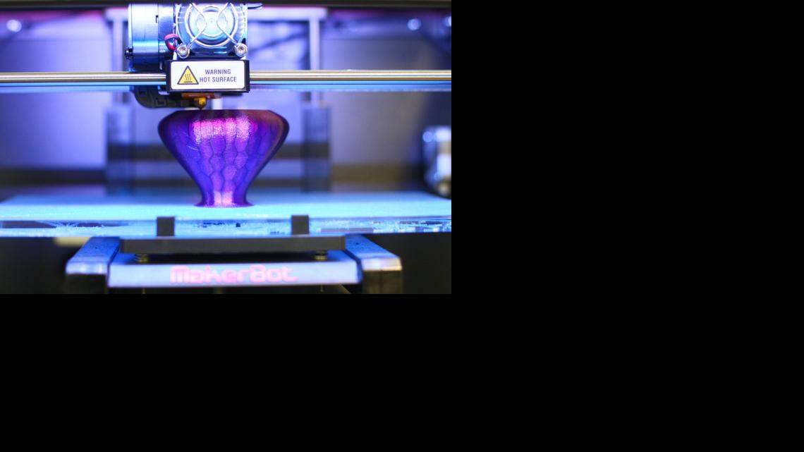 
 A vase is printed in MakerBot, a 3-D printer in use at in Maconaquah Middle School in Kokomo, Ind. A mechanical arm repeats the same pattern over and over, dispensing layer after layer of plastic to create the 3-D object designed by students in this Sept. 2, 2014 file photo.
