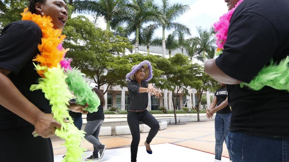 In 2014: Audrey Parfait, center, dances during the Give Miami Day to spotlight its fundraising campaign for Arts Education at the Adrienne Arsht Center for the Performing Arts of Miami-Dade County.