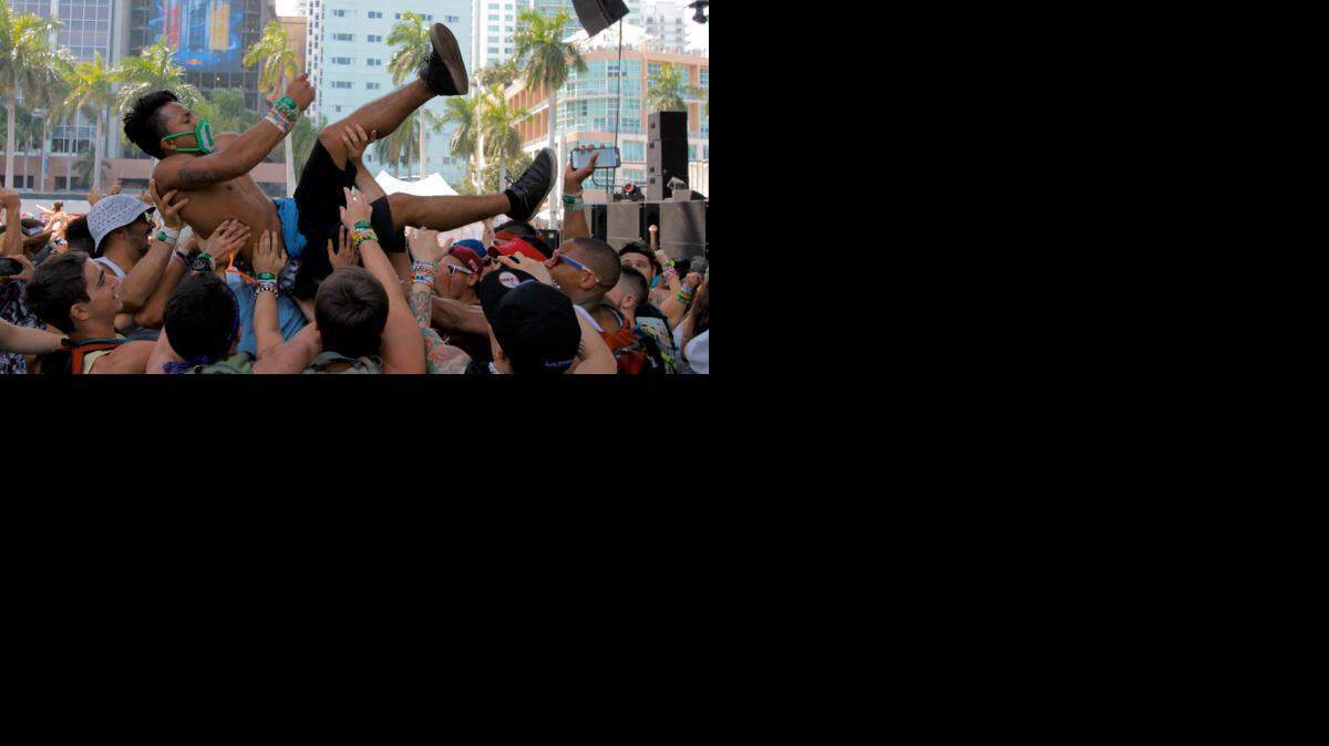 
A fan crowd surfs during Le Youth's set at the Worldwide Stage on Day 4 of Ultra Music Festival on Sunday, March 29, 2015.
