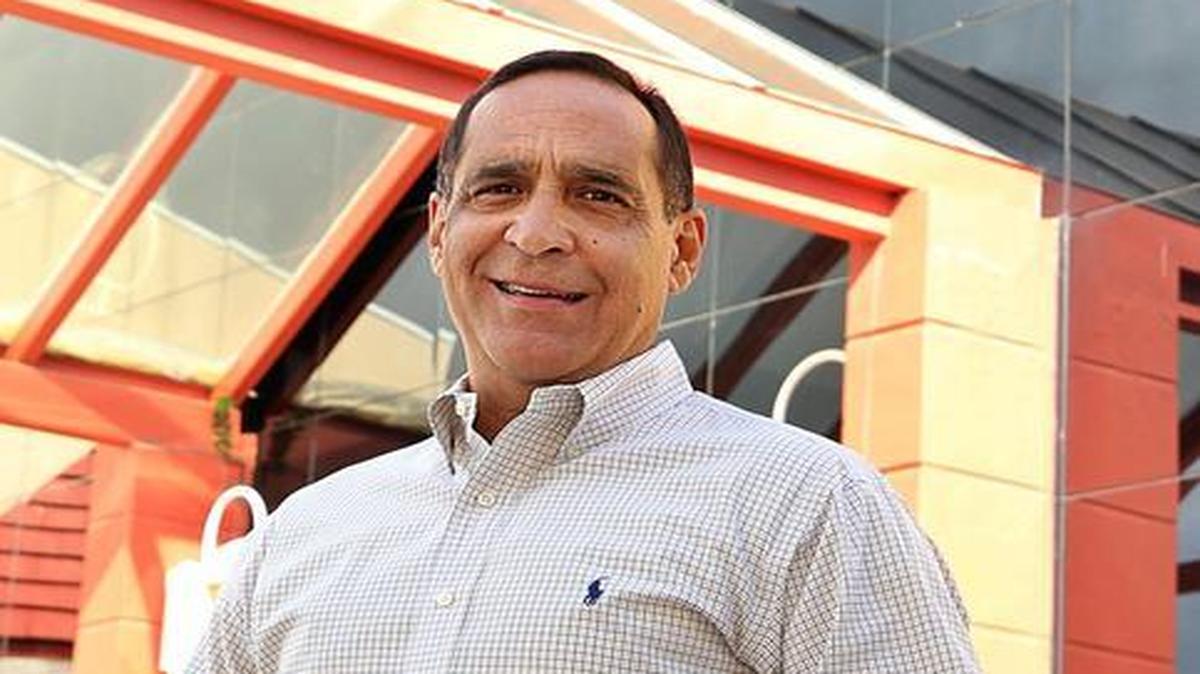 Joe Martinez, incoming county commissioner for District 11 in Miami-Dade, is photographed in front of the West End Regional Library. He has vowed to undo a signature accomplishment of his predecessor, Juan C. Zapata. That's the re-branding of West Kendall as "the West End."