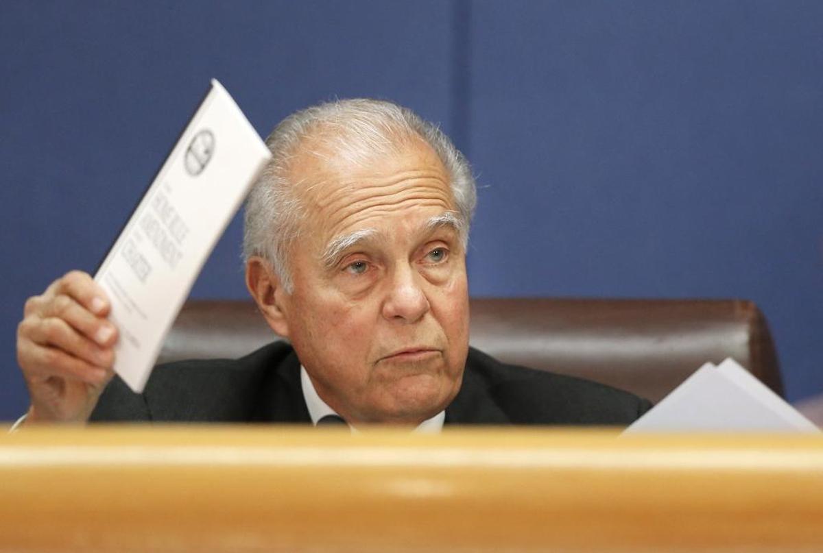 Miami-Dade Commissioner Javier D. Souto holds up the county charter as he makes a point at a 2016 commission meeting. He’s running for reelection in 2018.