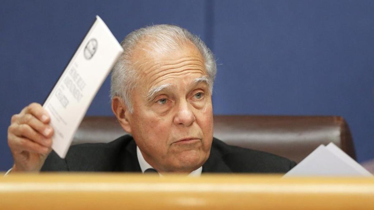 Miami-Dade Commissioner Javier D. Souto holds up the county charter as he makes a point at a 2016 commission meeting. He’s running for reelection in 2018.