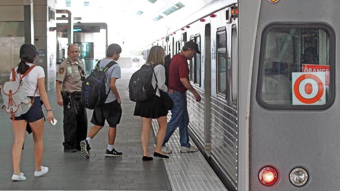 Airport passengers and commuters board the MIA Metrorail at the airport, the end of a 2.4-mile extension that is the lone expansion of the rail system since Miami-Dade voters agreed to a special transit sales tax in 2002.