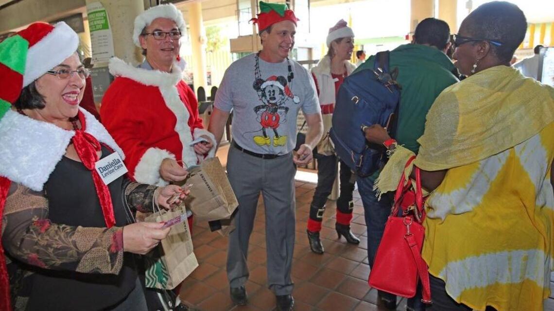 Metrorail commuters surprised by politicians masquerading as holiday characters