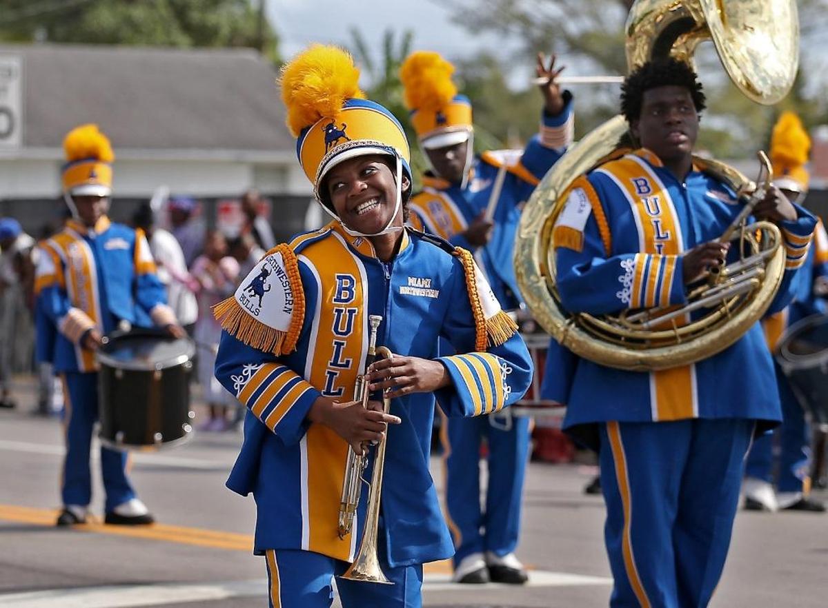 Northwestern High School Marching Bull Dominique Hightower enjoys herself while performing in the annual MLK Day parade along Northwest 54th Street in Miami on Monday, Jan. 16, 2017.