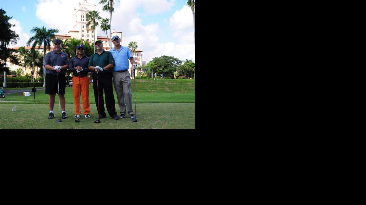 
Raising funds through golf at the University of Miami Sports Hall of Fame Celebrity Golf Tournament are first-place team members from left, Interim Coral Gables Police Chief Ed Hudak, Roger Bassett, Dr. Marco Leyte-Vidal and Dr. Scott Ross. 
