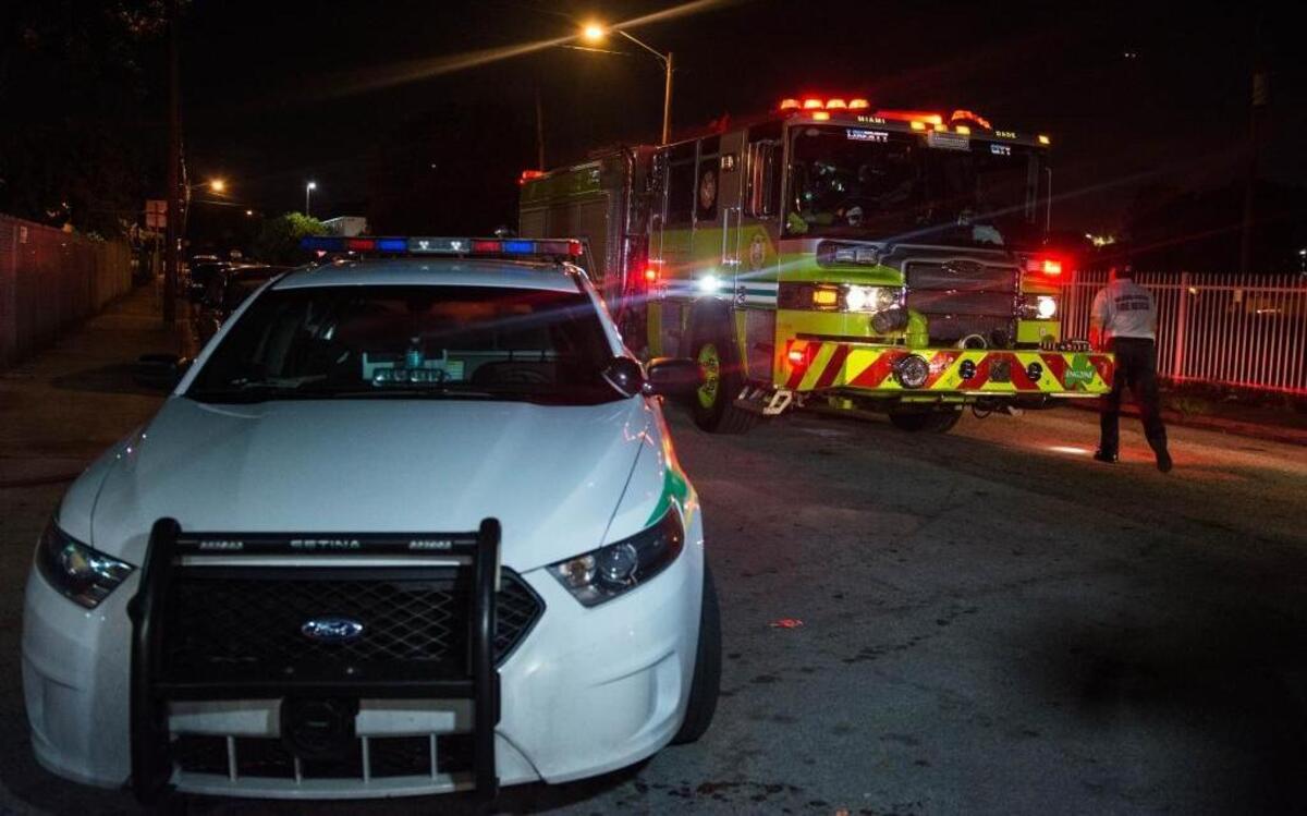 Miami-Dade Police Department and Miami-Dade Fire Rescue spray blood off the sidewalk of 4625 24th Ave., where a 13-year-old boy, Cedrick Pernell, was shot on Tuesday night, Sept. 20, 2016. He was transported to Jackson Memorial Hospital, where police say he is in stable condition.