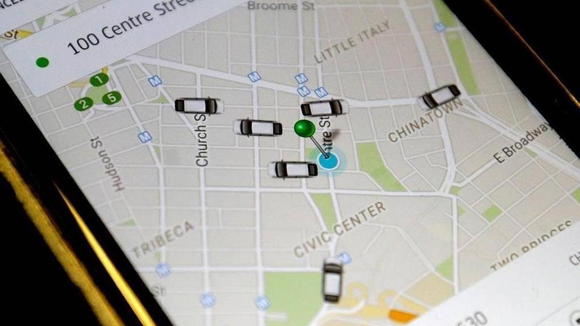 The Uber app at work. The company’s drivers face $3 million in fines in Miami-Dade County.