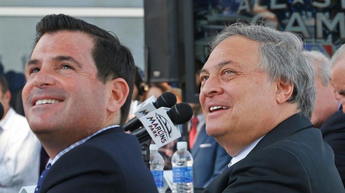 David Samson, the former president of the Miami Marlins, and former owner Jeffrey Loria, attend an event at Marlins Park in 2015. Miami-Dade County and Miami sued the Miami Marlins to recover money from a profit-sharing deal that former owner Jeffrey Loria claims yielded a paper loss on a $1.2 billion sale to Derek Jeter and partners. The case is settling for $4.2 million. 