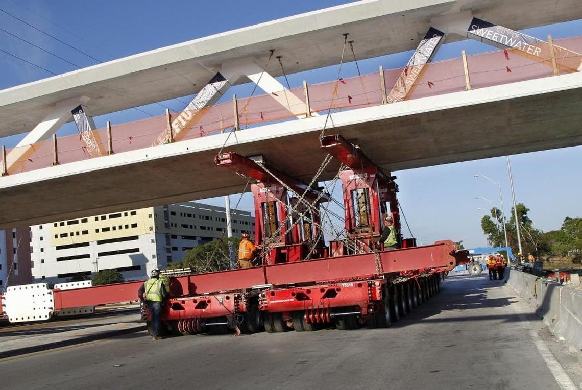 Engineers not connected to the bridge design or construction have wondered whether transporters were properly positioned when the 950-ton bridge was moved and lifted into place over Southwest Eighth Street.