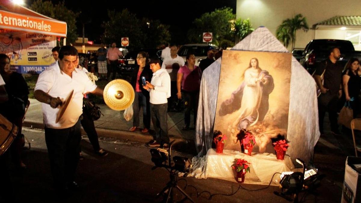 Ivan Morales plays a song in dedication to the Immaculate Conception of Mary in Sweetwater. Nicaraguans celebrated La Griteria, a Catholic religious and traditional event observed in the Central American country.