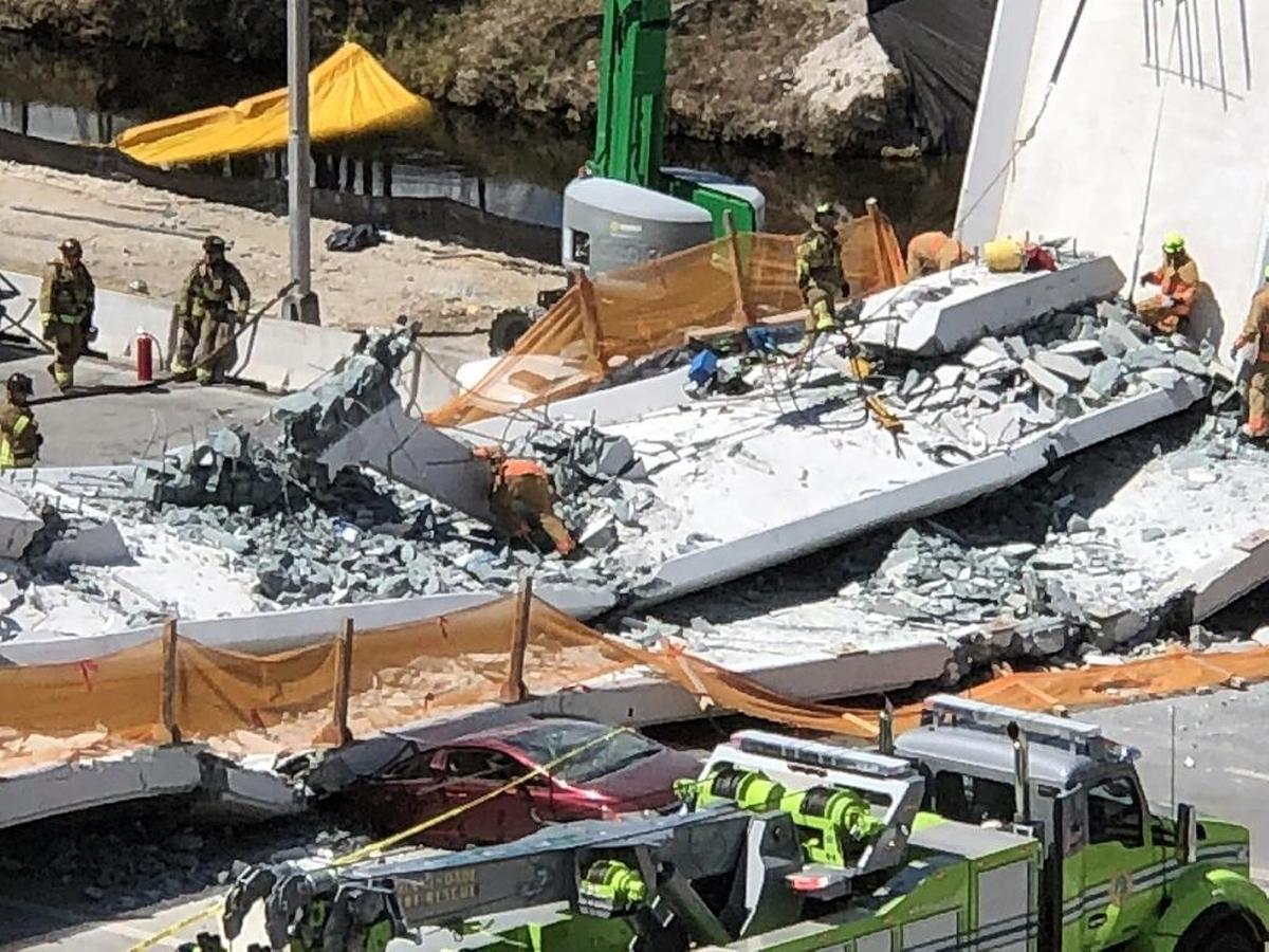 Just after the collapse, rescue workers searched the north end where workers were adjusting tensioning cables at the time the bridge abruptly fell.