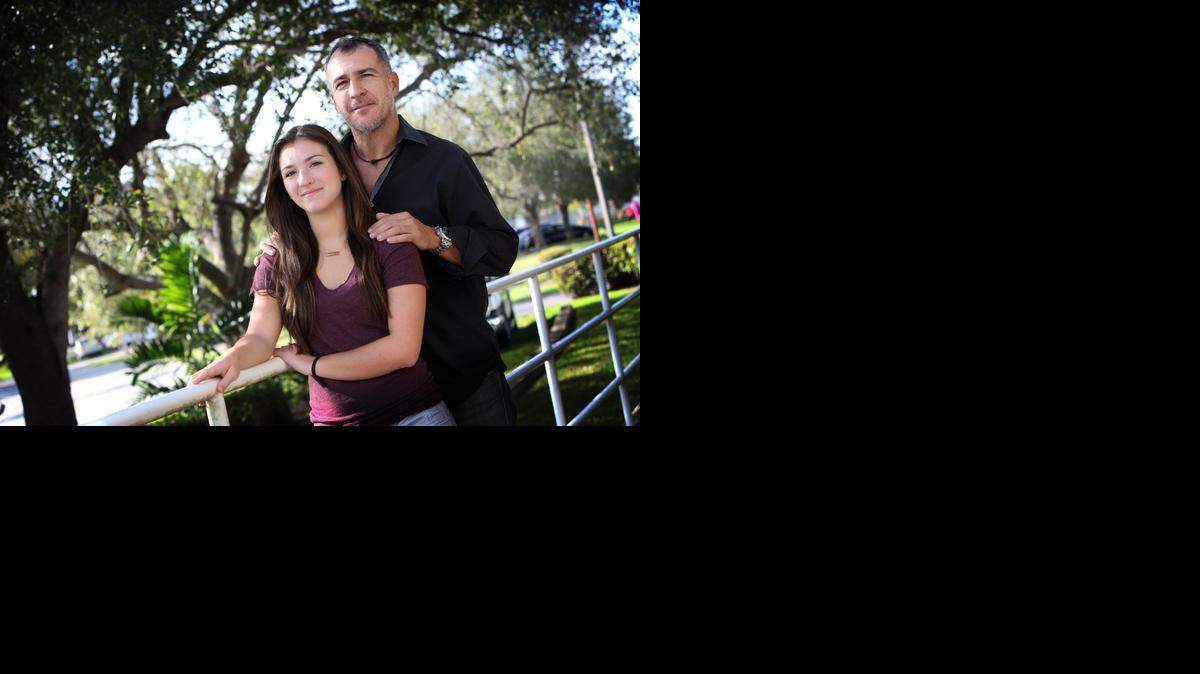
Robert Pozo with his daughter, Nina, 17. Pozo is lending his expertise to help organize a Mothers Against Drunk Driving annual 5K walk-run in February, eight months after a teenager suspected of drunk driving killed Pozo's mother in a crash.

