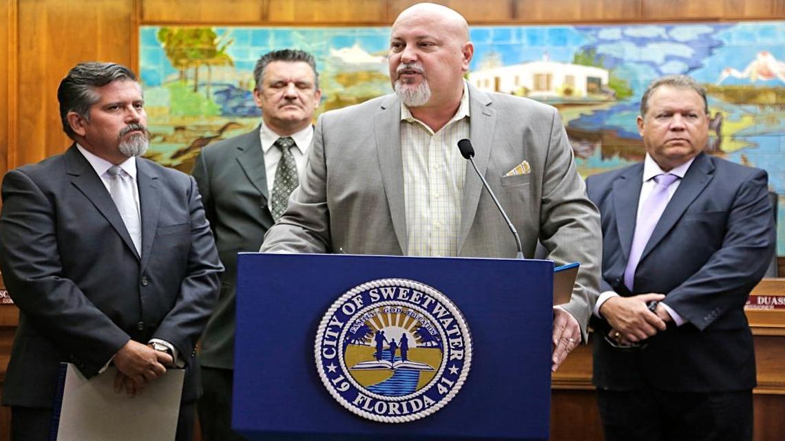 Sweetwater Mayor Orlando Lopez, center, holds a press conference Monday, March 5, 2017, along with his attorney, Joseph Carballo, left, as he announces a lawsuit he has filed challenging the recall by the city commission.
