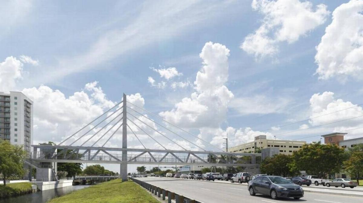A rendering shows the completed pedestrian bridge connecting Florida International University’s main campus to Sweetwater over the Tamiami Trail (Southwest Eighth Street).