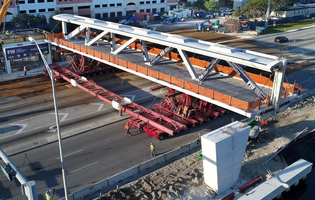 The main span of the FIU-Sweetwater UniversityCity Pedestrian Bridge was moved into position over the Tamiami Trail by four motorized lifts on March 10.