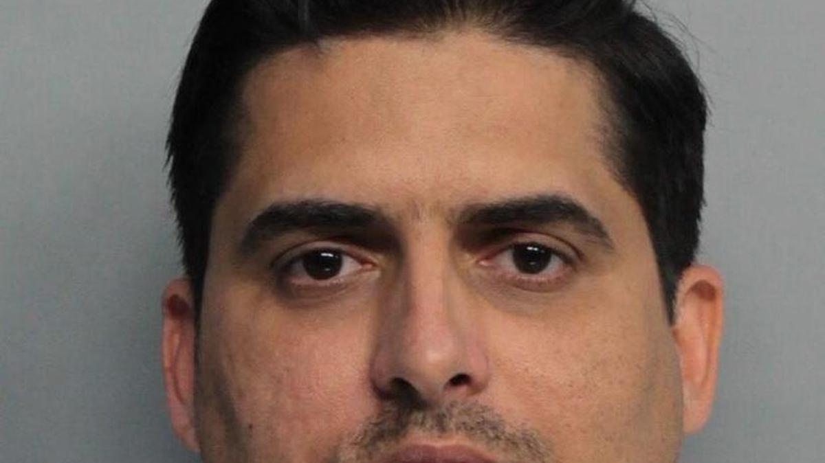 Jimmy Hernandez, co-owner of a West Dade jewelry store, arrested on a charge of selling counterfeit high-end jewelry.