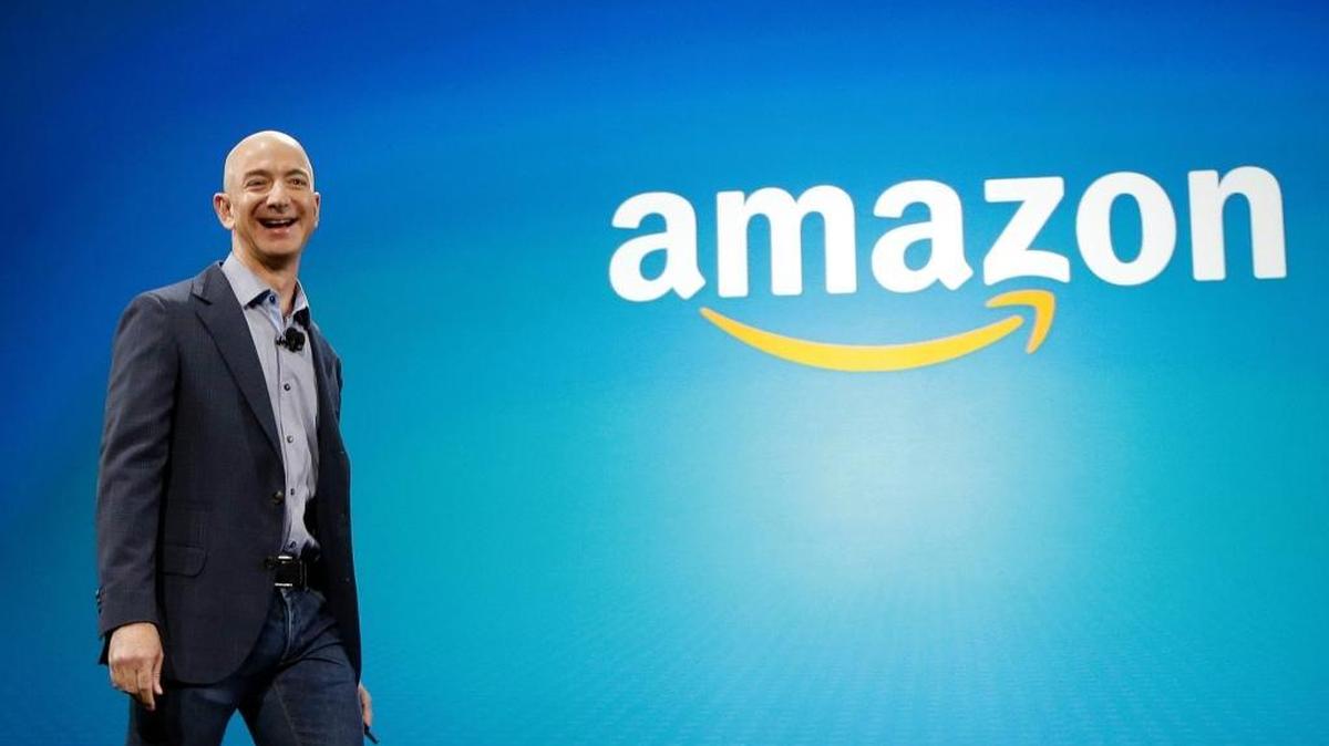 Amazon CEO Jeff Bezos walks onstage during a 2014 company event. Four years later, the company has outgrown its Seattle headquarters and is on the hunt for a second place to call home. Miami is on the list, and the search comes as Miami-Dade County wants to sweeten the pot for its corporate-relocation incentives.