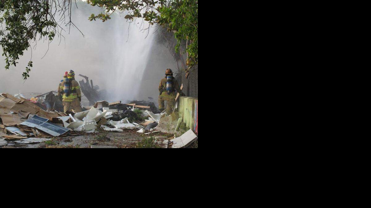 
Charred debris remains after Miami Fire Rescue crews battled a stubborn trash fire at Northeast Second Avenue and 79th Street Monday.
