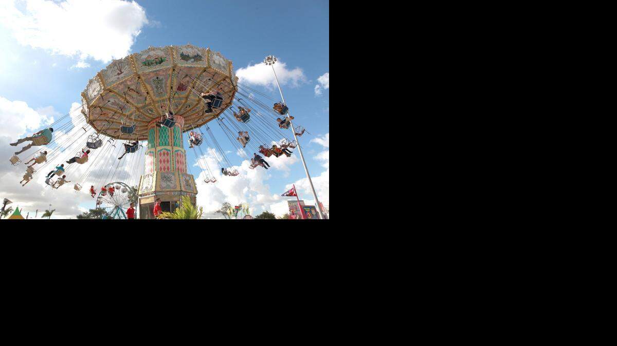 
Each year, rented fairgrounds at Tamiami Park are transformed into the Youth Fair, a four-week county fair. Florida International University, the state school next door, last fall won voter approval to take over the fairgrounds provided Miami-Dade can find another site for the fair. 
