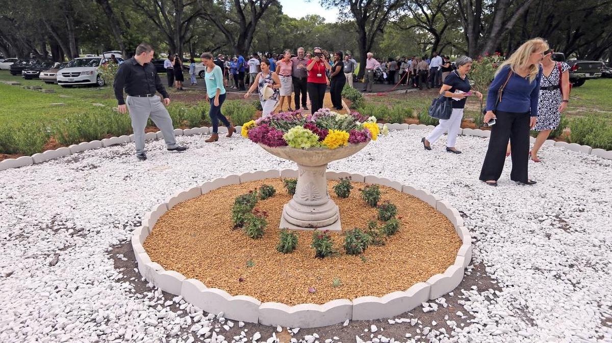 
In honor of 9/11, VITAS Healthcare and the Miami-Dade County Medical Examiner Department is unveiling a special Memorial Scatter Garden in the Miami-Dade County Cemetery for cremated indigents. Dr. Bruce Hyma, Chief, Miami-Dade Medical Examiner, representatives and volunteers from VITAS Healthcare attended the ceremony, September 11, 2015.
