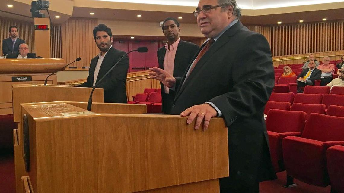 Joe Geller, a Democratic member of the Florida House and lawyer for a group pushing new campaign-finance rules, addresses Miami-Dade commissioners during a meeting on Wednesday, Sept. 7, 2016. At the other lectern is Juan Cuba, executive director of the Miami-Dade Democratic Party. Behind them, also waiting to speak in favor of the rules, is Gihan Perera, head of New Florida Majority.