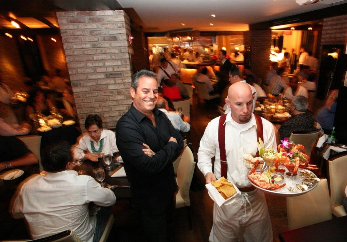 A scene from Prime 112 (and owner Myles Chefetz in black). The restaurant would see a higher food tax if the leader of Miami-Dade’s homeless board succeeds in expanding the county’s homeless tax to Miami Beach and two other coastal cities.