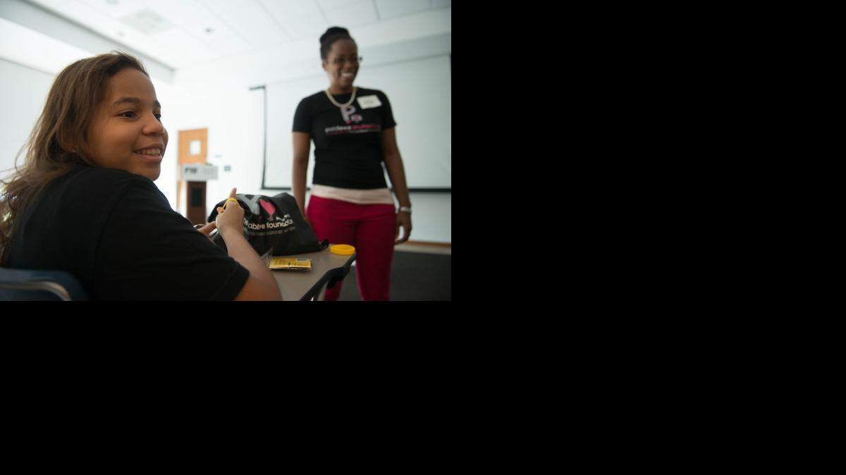 
Cindy Rodriguez looks to her brother Heber, not pictured, after Pablove Shutterbug instructor Kelsa Bartley asks students to review their photos from the five-week art therapy photography course at The Patricia and Phillip Frost Art Museum on FIU's campus . The Pablove Shutterbug program, in conjunction with The Art Shack and sponsored by The LIVESTRONG Foundation, uses art therapy through photography to provide a creative, fun outlet for kids coping with cancer 15 cities nationwide.
